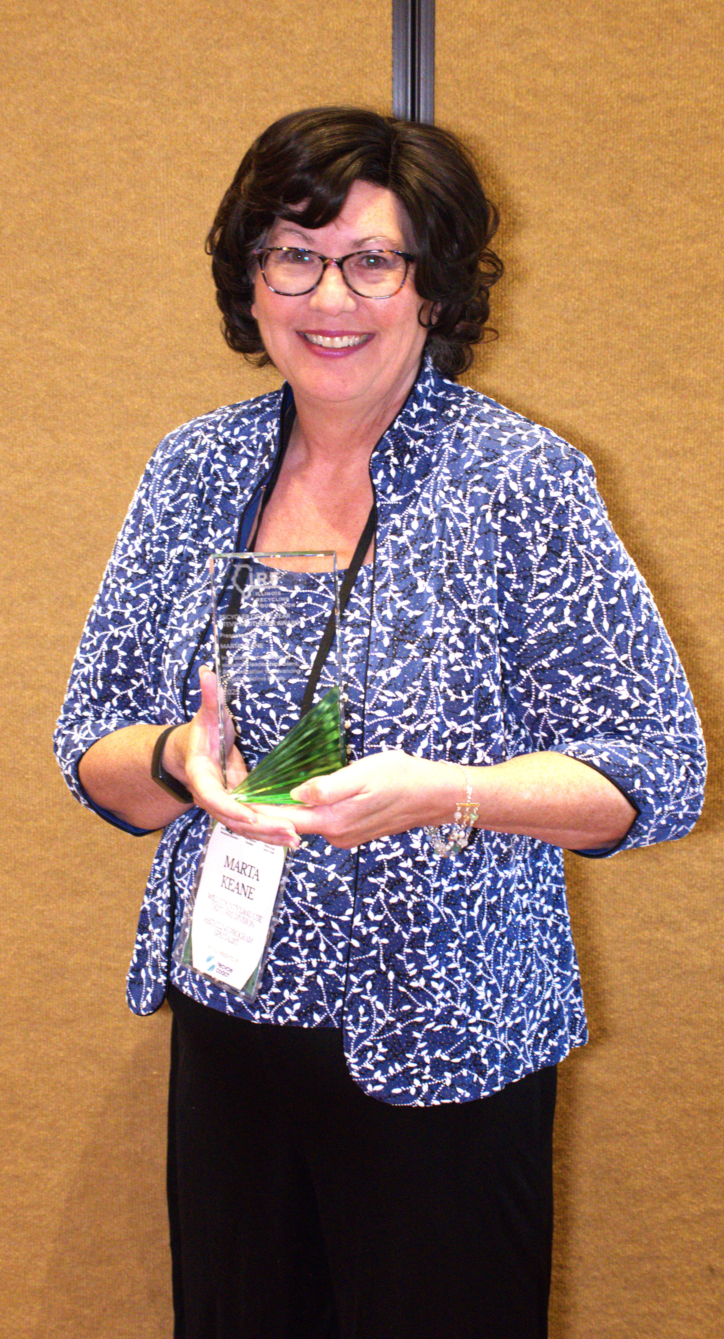 Marta Keane with her award